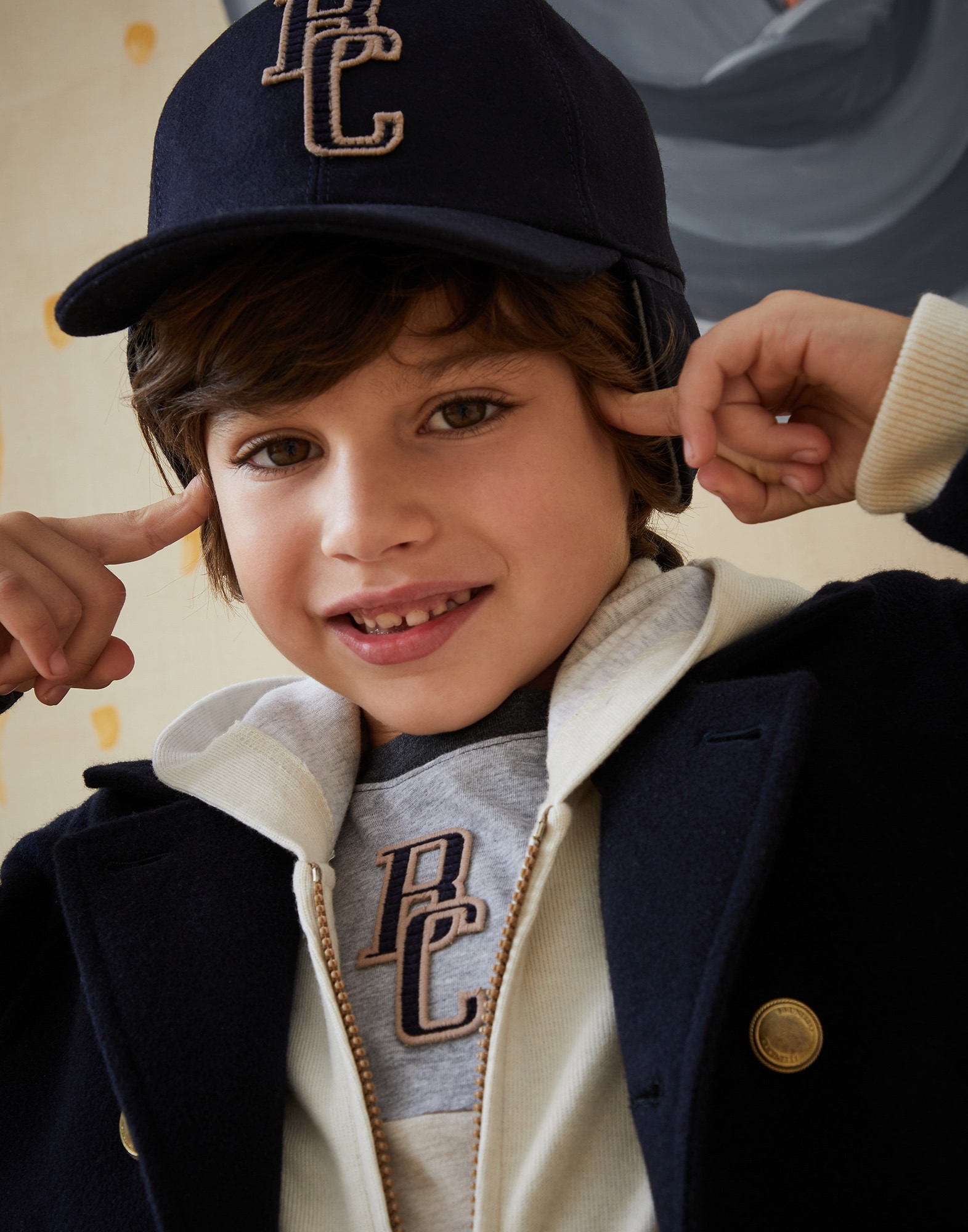 boy in baseball cap