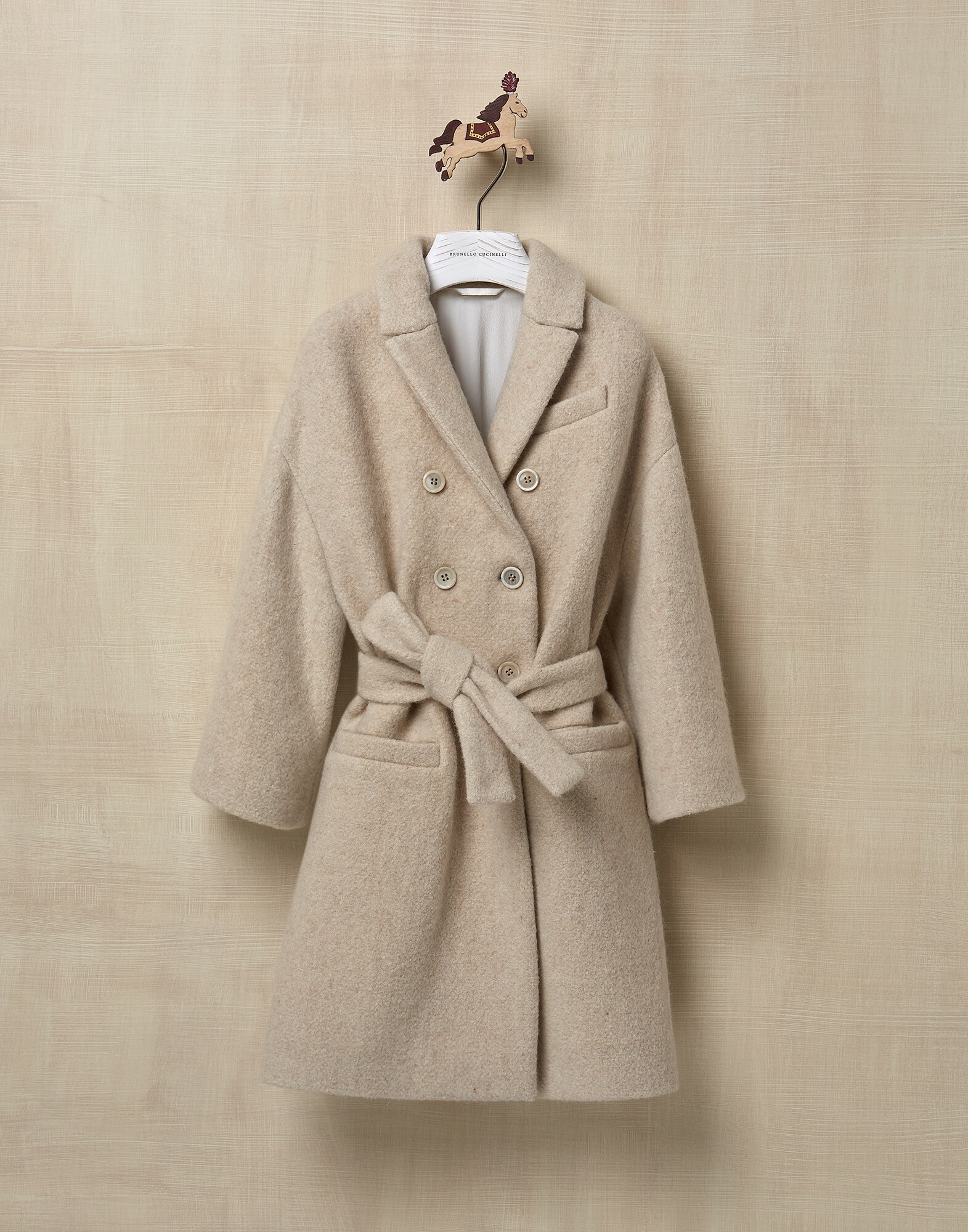 Coat with monili