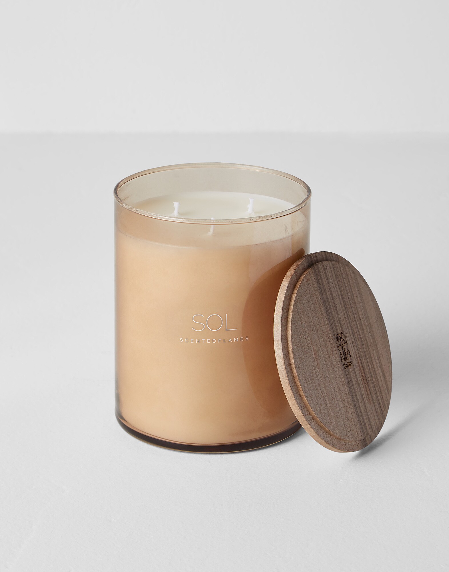Scented candle with Sol fragrance