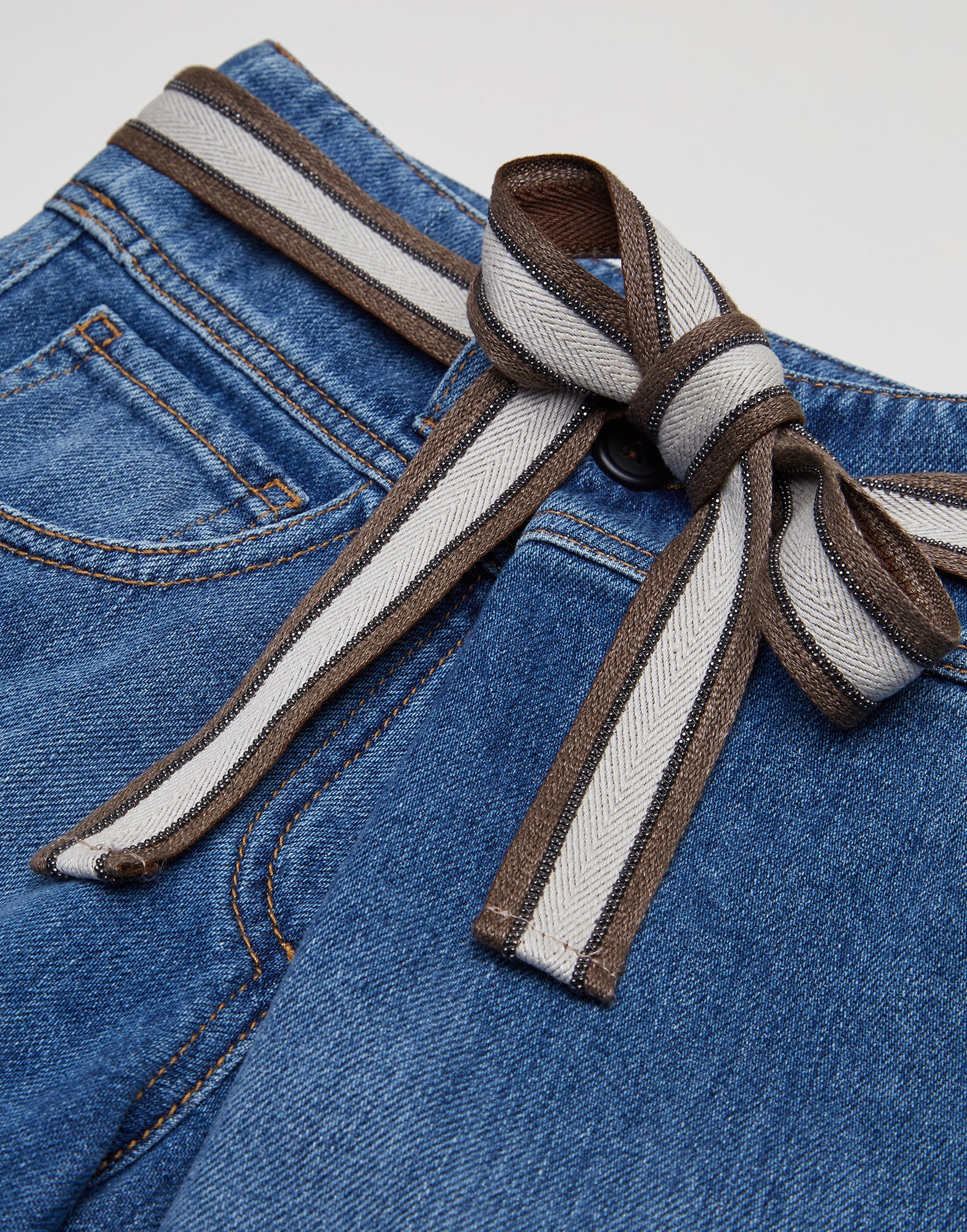 soft denim baggy trousers with belt and monili