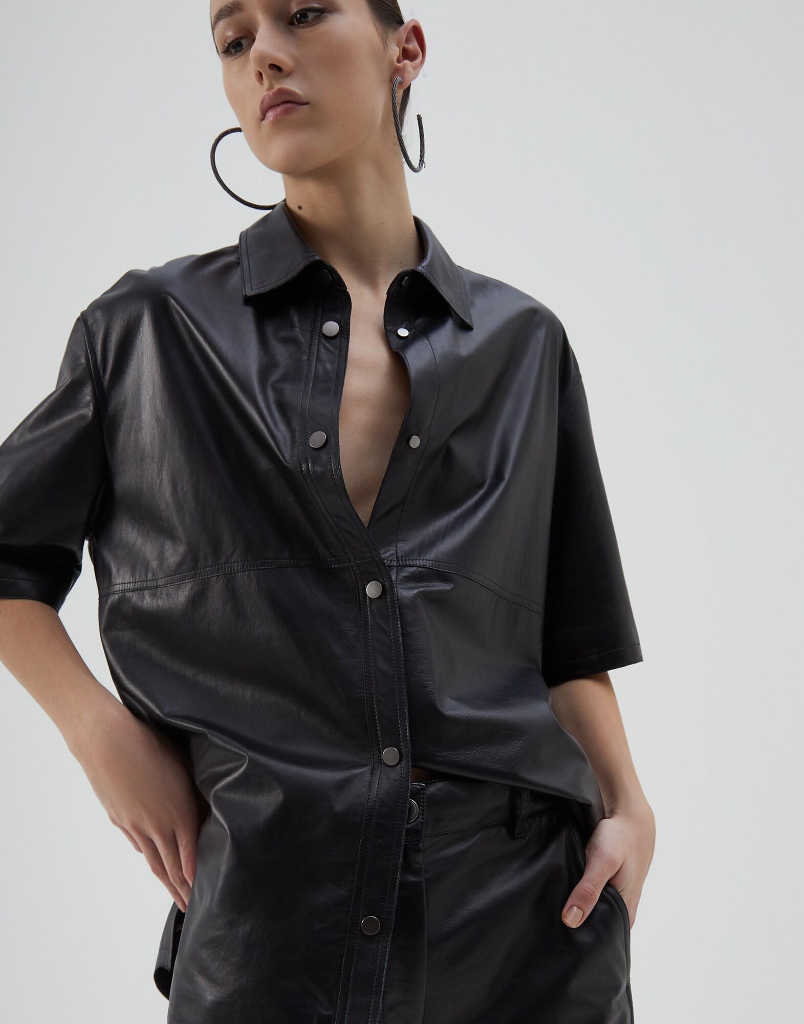 Shirt with monili